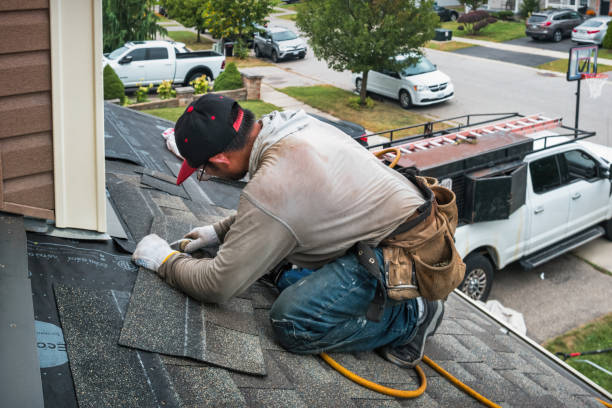Professional Roofing technician working in Westwood, CA